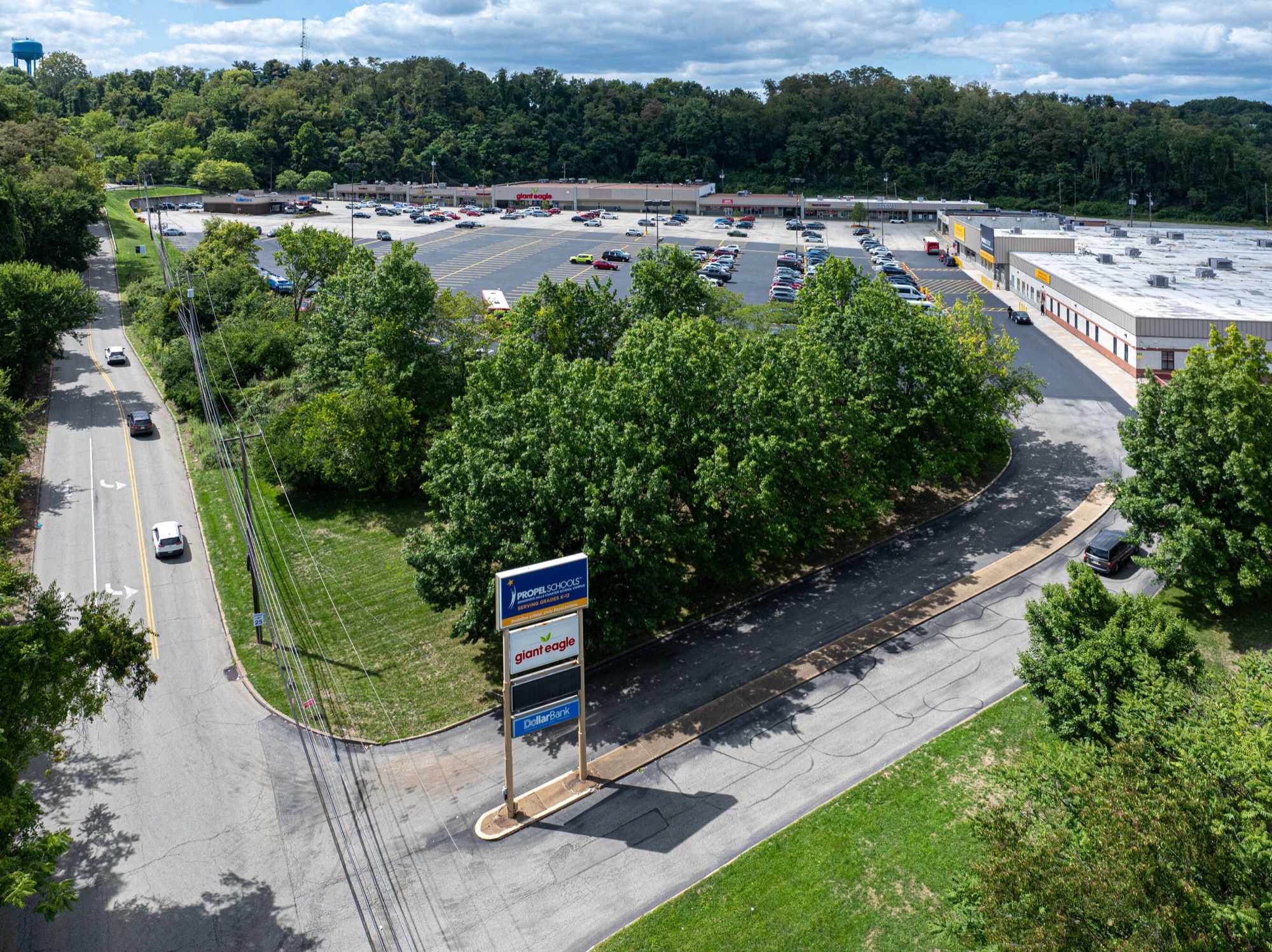 Aerial view of a grocery-anchored, multi-tenant retail center