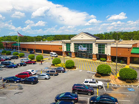 Grocery-anchored neighborhood retail center with parking