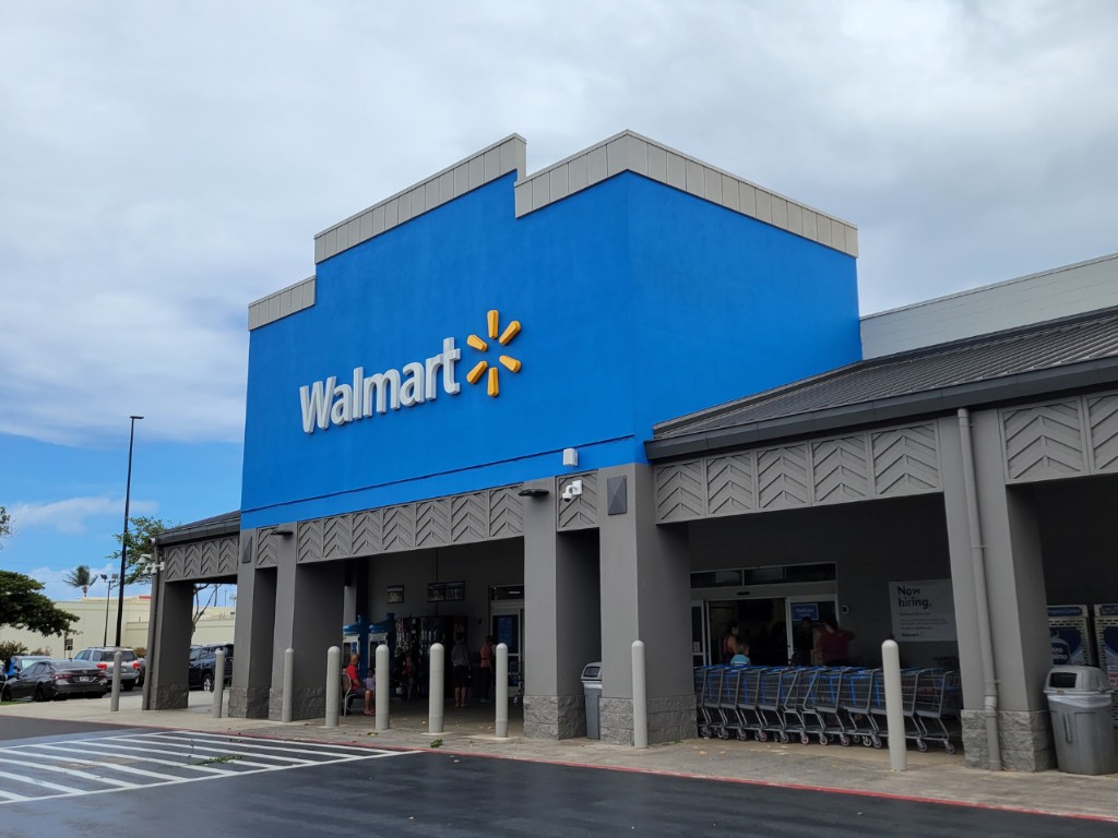 Walmart storefront with customer entry and parking access